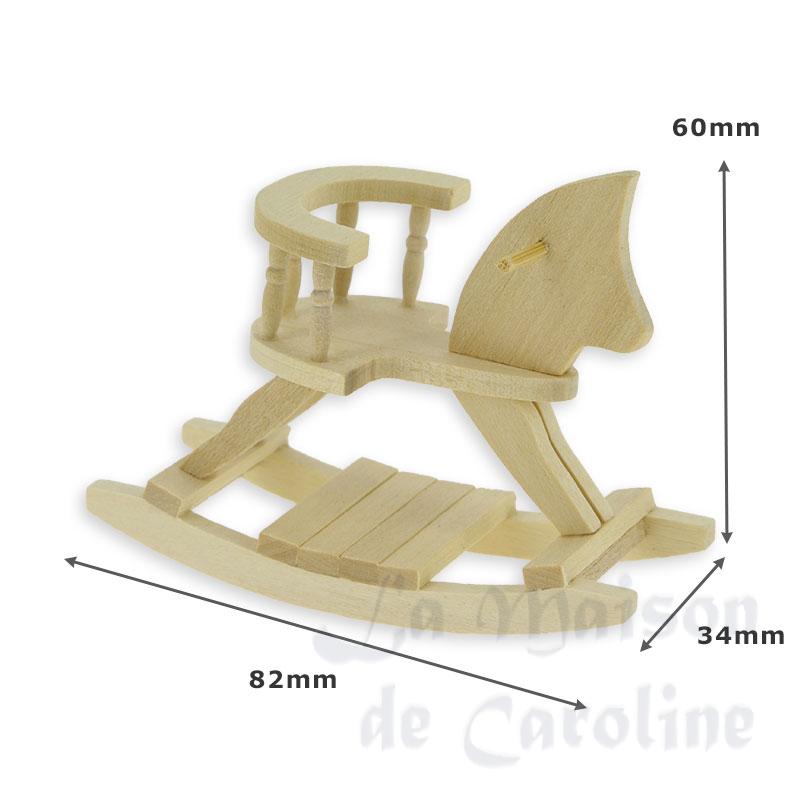 Cheval a bascule non verni Bilder 1