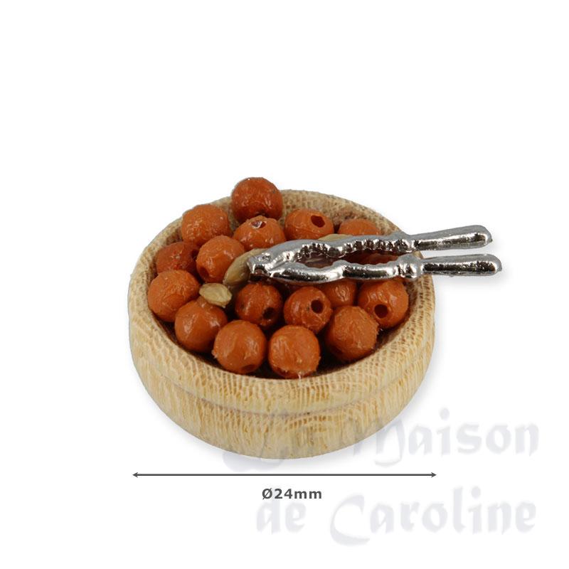 Noix dans saladier avec casse-noix Bilder 1