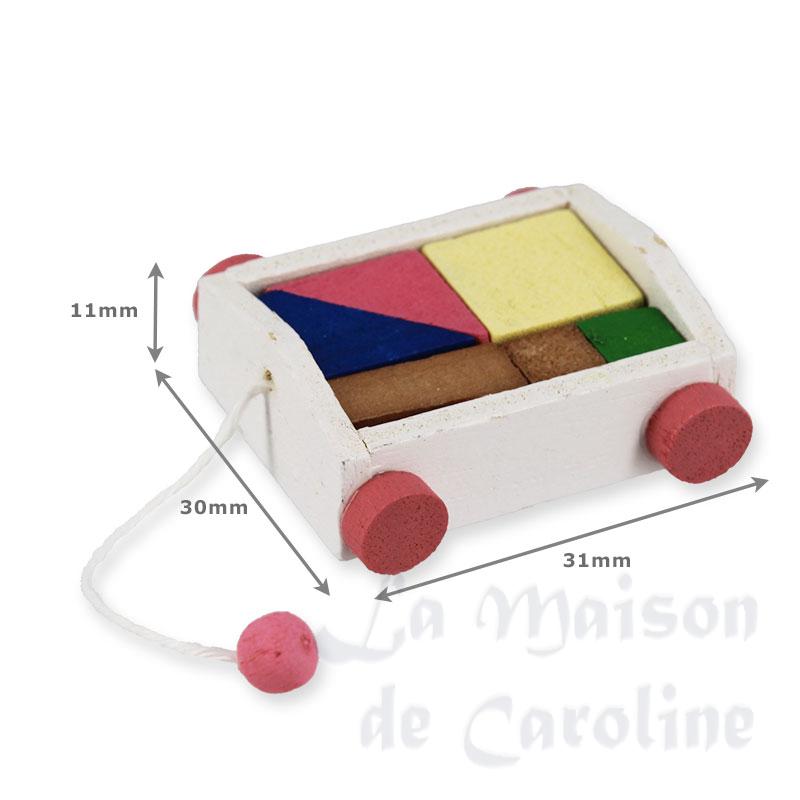Charriot de jouets avec cubes Bilder 1