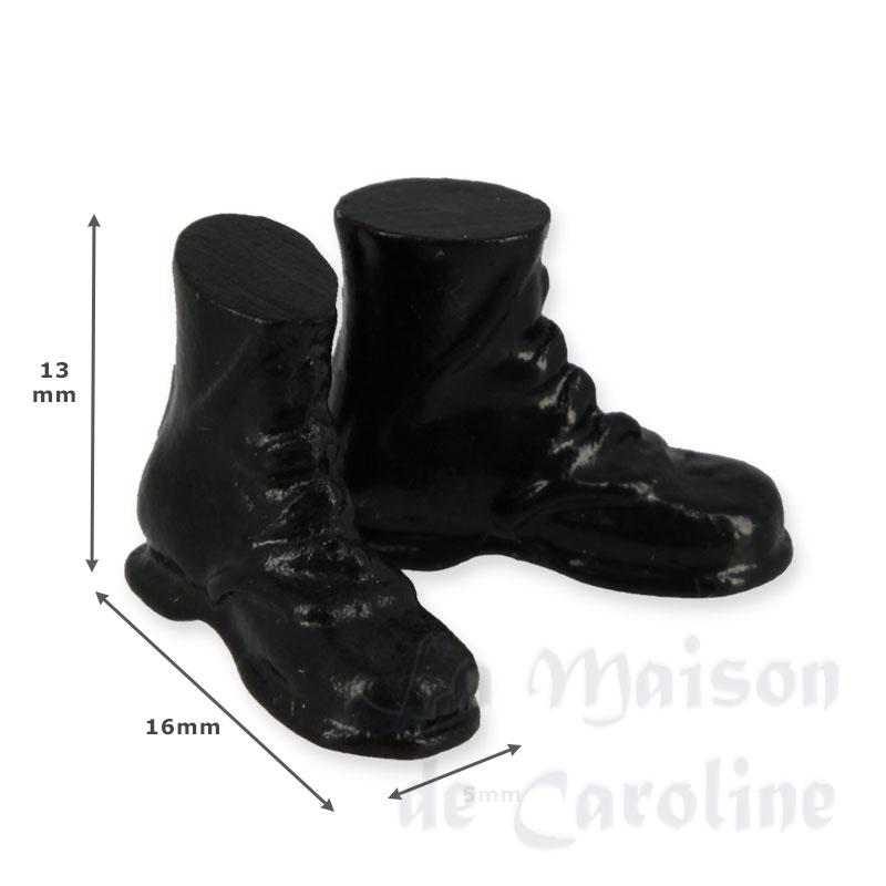 Paire de chaussures hautes noires Bilder 1