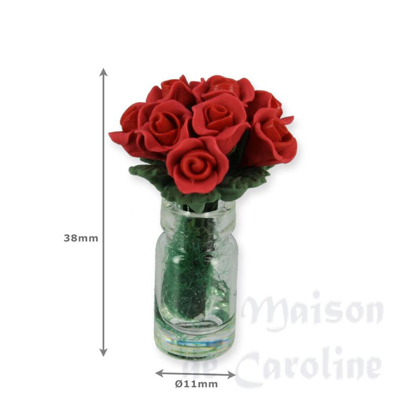 Bouquet de roses foncées dans vase Bilder 1