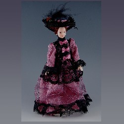Poupée porcelaine femme robe rose-noire