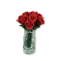 Bouquet de roses foncées dans vase